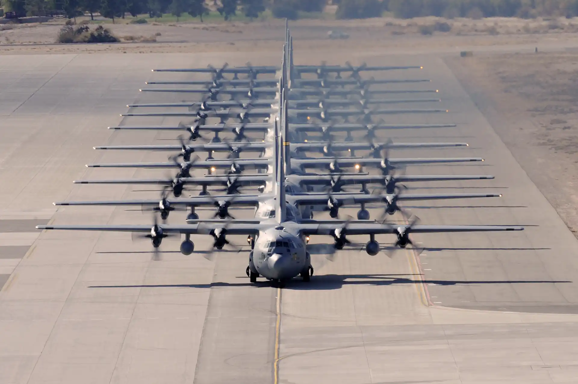 Line of C-130 aircraft on the runway